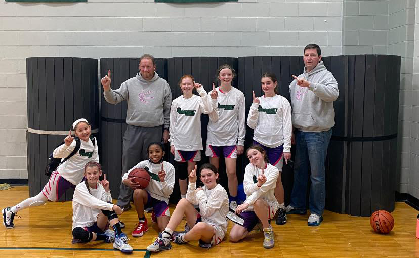 sixth grade cranston girls travel team holding up number one