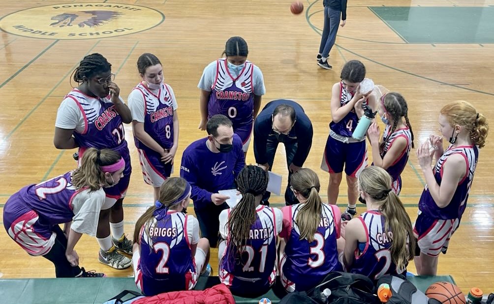 seventh grade cranston girls travel team in huddle